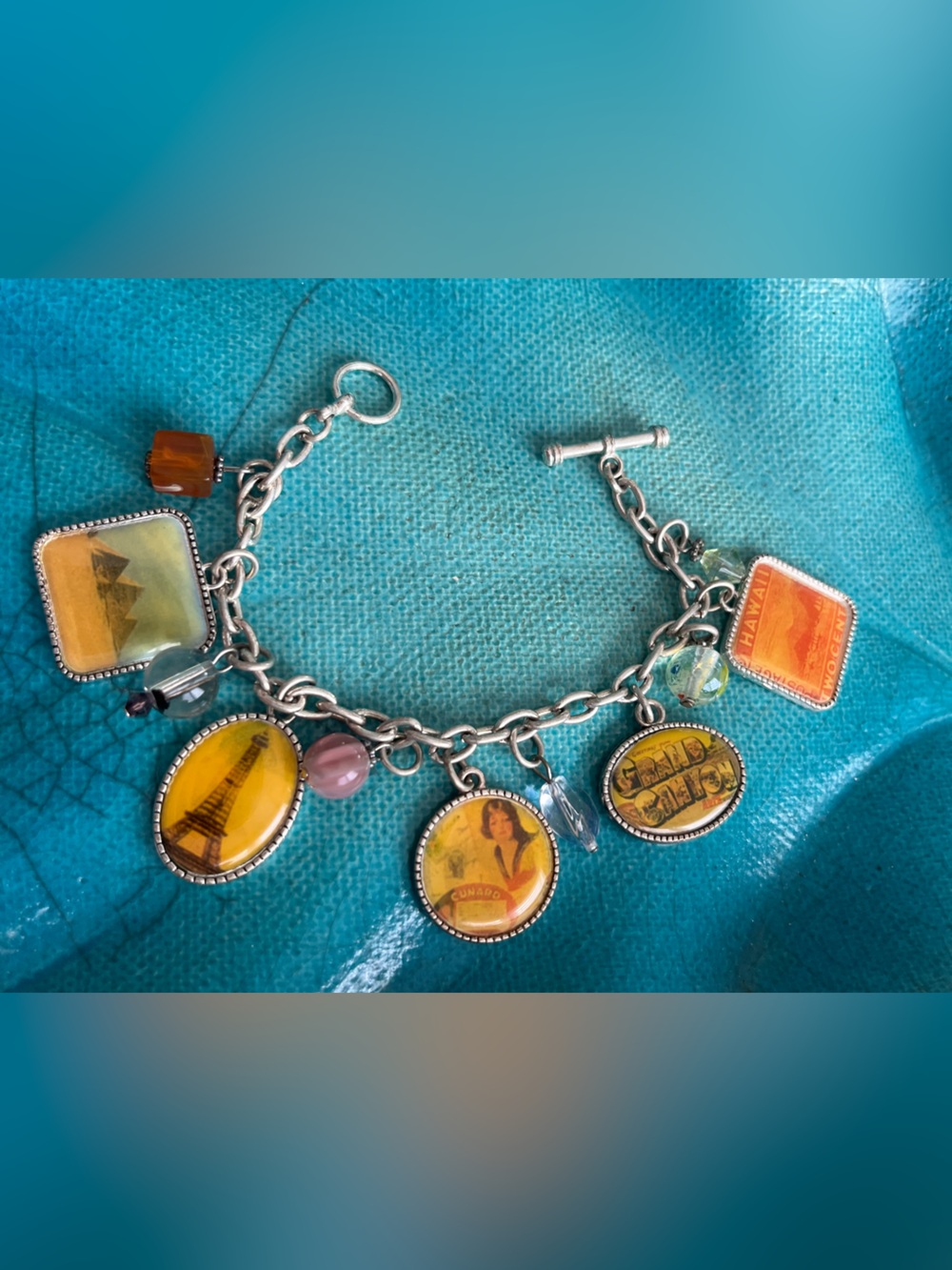 Silver Charm Bracelet with Yellow & Orange Travel Image Charms